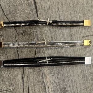 Elegant Black and Silver Cross Bracelets